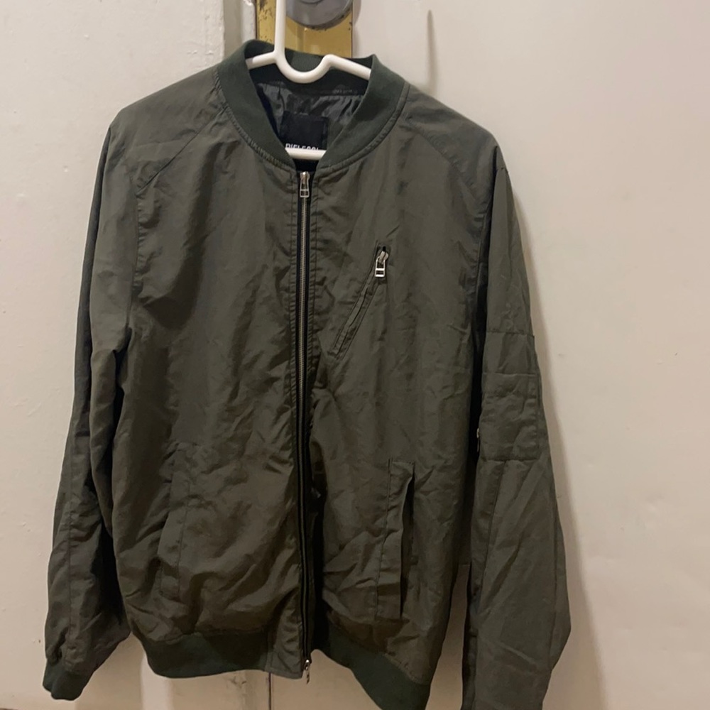 Olive green boomer light weight packable jacket